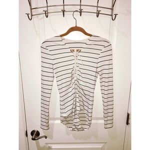 White body suit with black stripes
